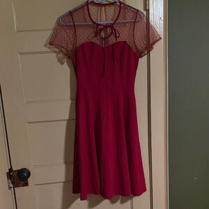 Elegant Red Dress with Sheer Polka Dot Detail